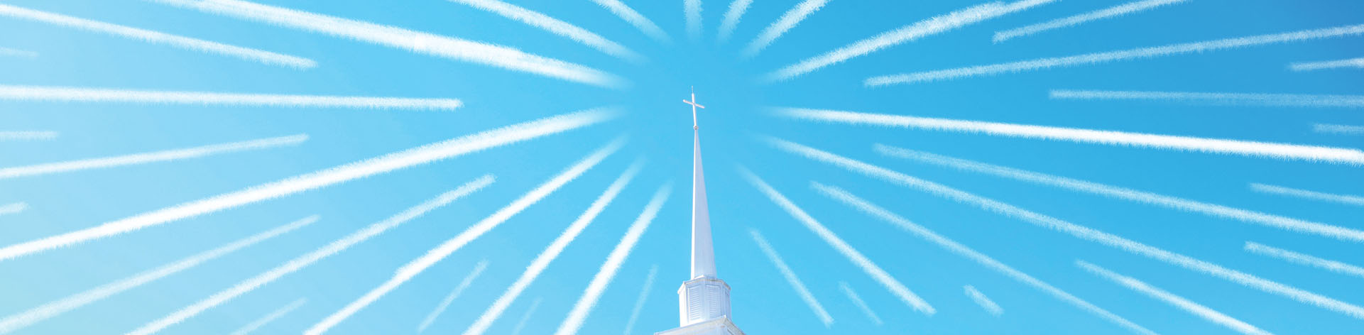 Top of church steeple in blue sky