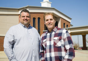 Pastors Sanford and Gandara in front of Sunnylane Baptist Church